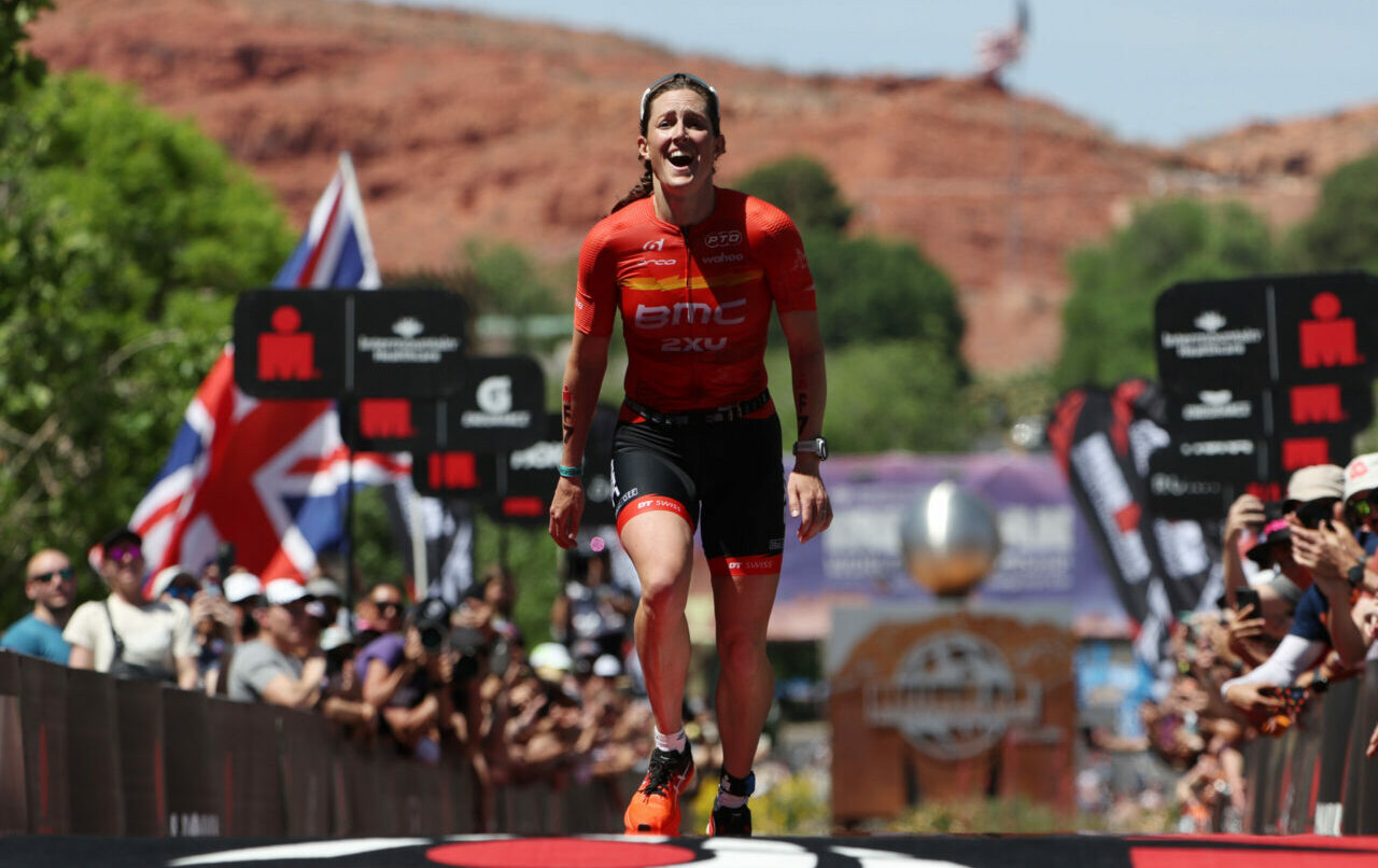 ST GEORGE, UTAH - MAY 07: Kat Matthews of Great Britain celebrates after crossing the finish line to place second in the 2021 IRONMAN World Championships on May 07, 2022 in St George, Utah. (Photo by Tom Pennington/Getty Images for IRONMAN)