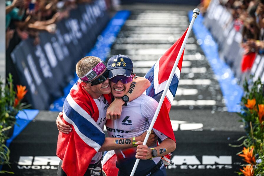 Casper Stornes and Gustav Iden celebrate at the finishing line of the IRONMAN World Championships in Nice, 2025.