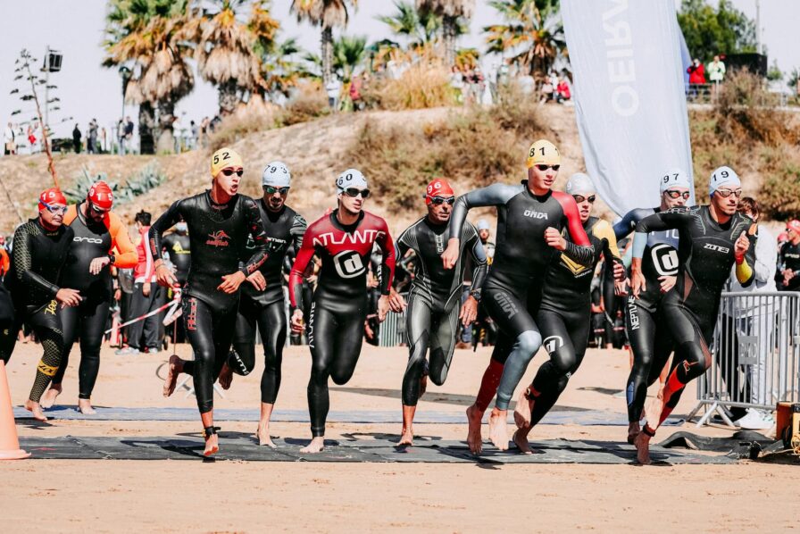 triathlon transition area with bikes and gear setup