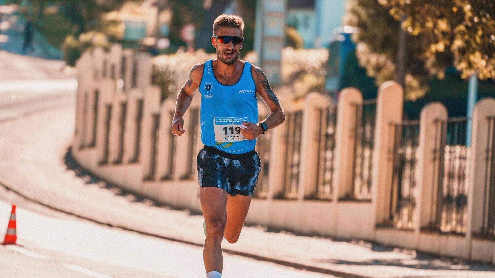 triathlete planning weekly training schedule with running cycling and swimming sessions