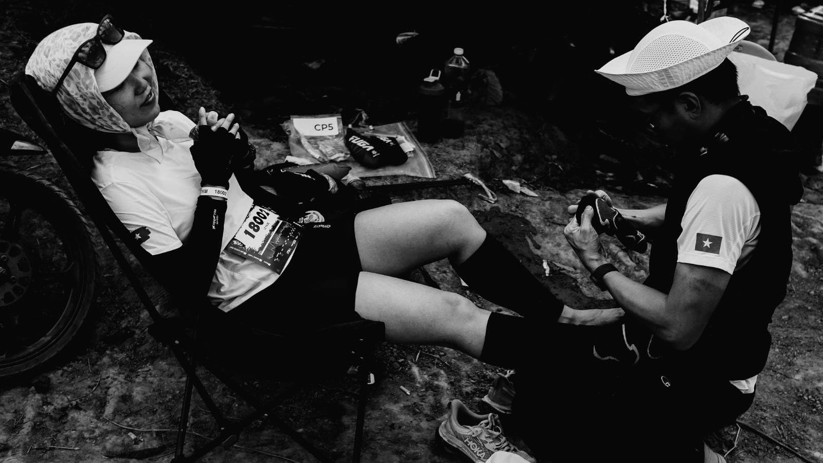 triathlete experiencing leg pain from stress fracture during endurance training session