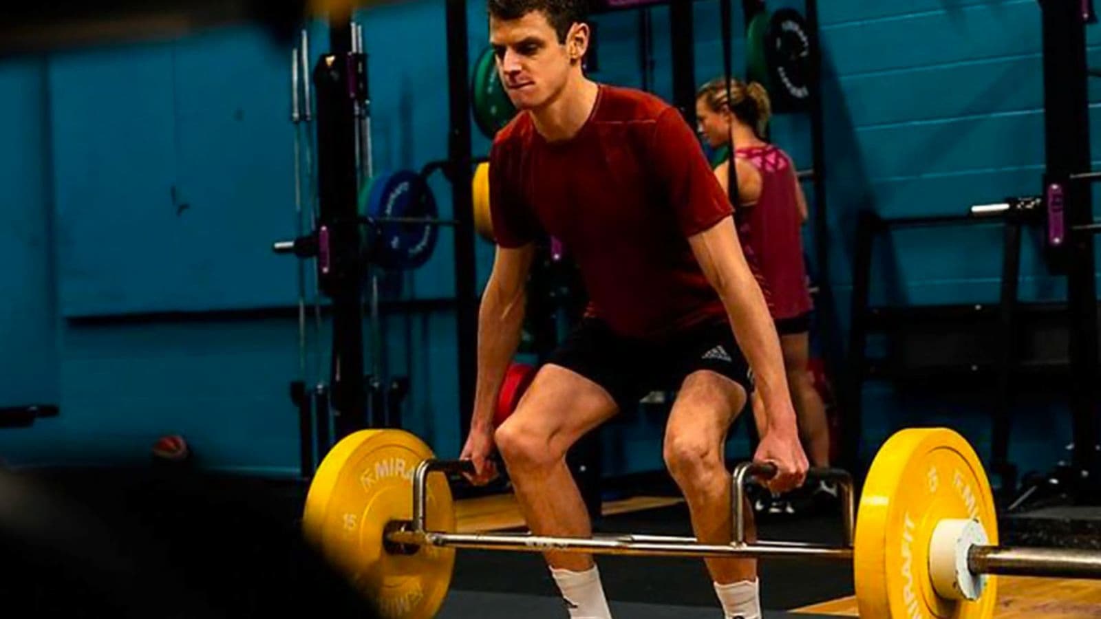 triathlete practicing swim bike and run technique during structured endurance training session