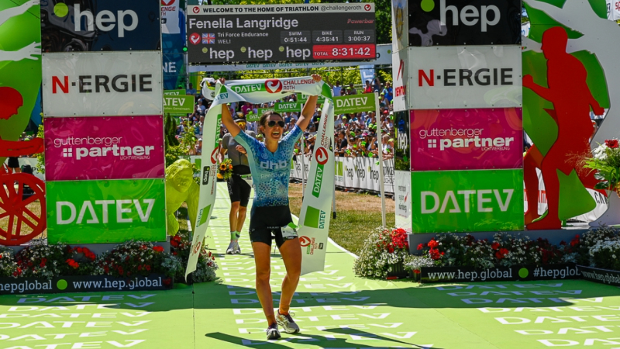 Fenella Langridge crosses the line at Challenge Roth 2022.